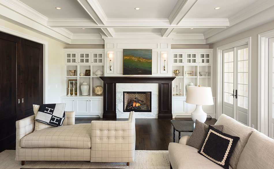 Medina Cape Code family room with fireplace and couches